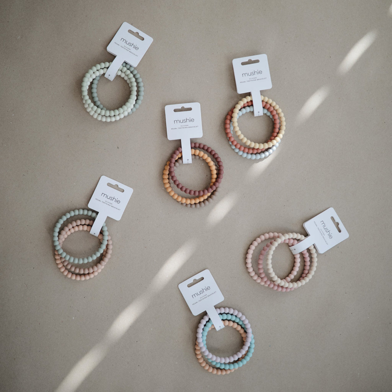 3er-Set Perlen Beißarmbänder Silikon Lilac/Cyan/Soft Peach